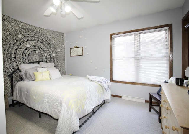 bedroom with light carpet and ceiling fan