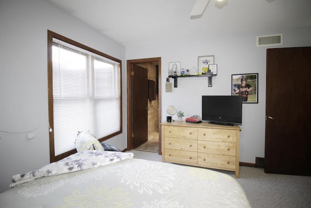 bedroom with light colored carpet and ceiling fan