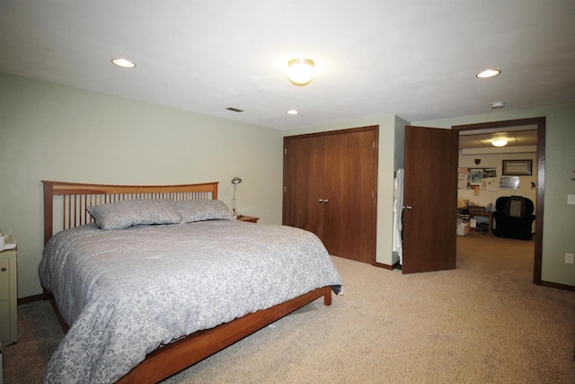 bedroom with a closet and carpet