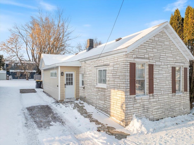 view of snow covered property