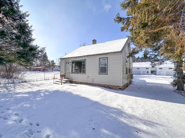 view of snow covered property