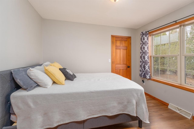 bedroom featuring hardwood / wood-style flooring