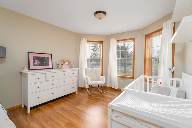 bedroom featuring light wood-type flooring