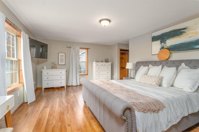 bedroom with light hardwood / wood-style floors