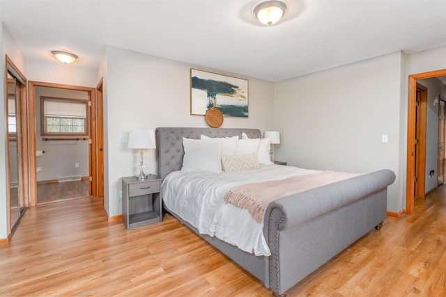 bedroom with light hardwood / wood-style flooring