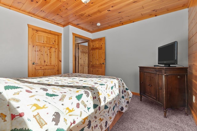 carpeted bedroom with ornamental molding and wood ceiling