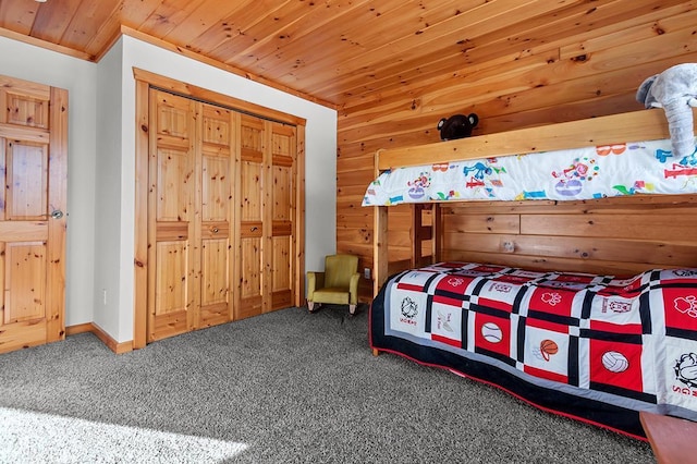 bedroom featuring carpet flooring and wooden ceiling