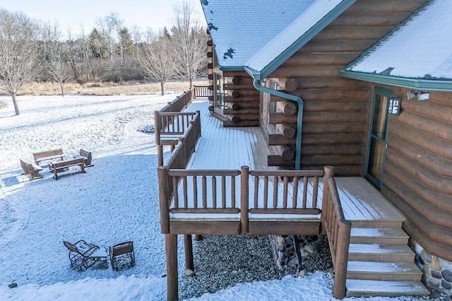 view of snow covered deck