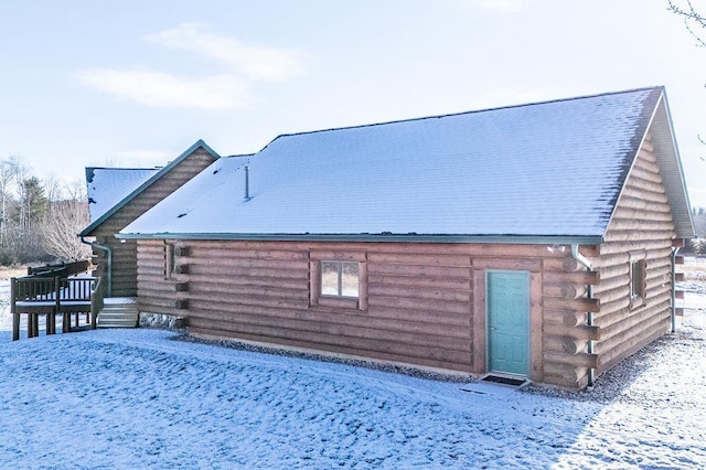 view of snow covered property