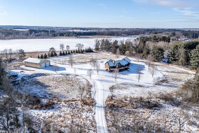 snowy aerial view with a rural view