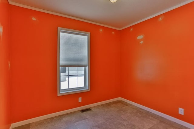 spare room with ornamental molding