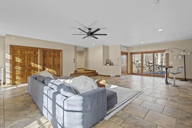 living room featuring ceiling fan