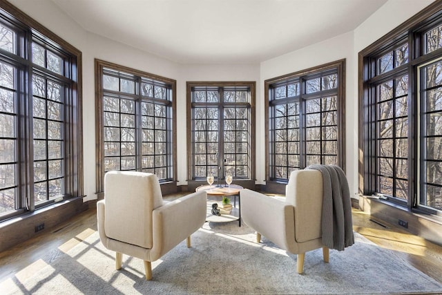 sitting room featuring carpet