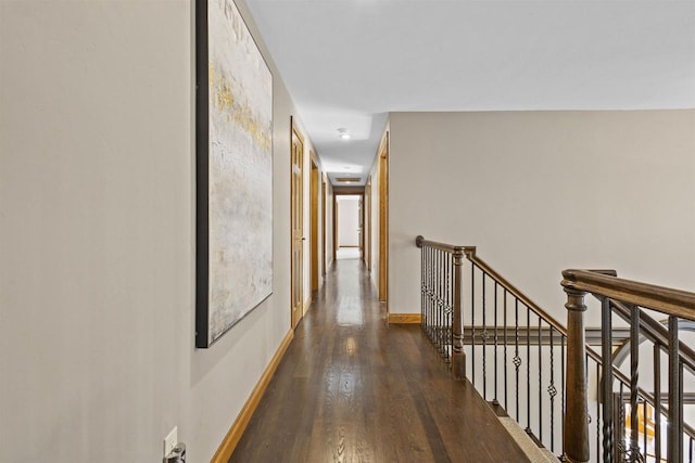 corridor featuring dark hardwood / wood-style flooring