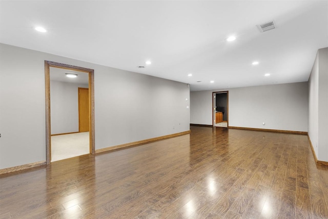 empty room featuring wood-type flooring