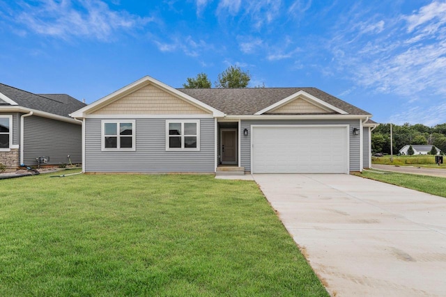 single story home featuring a garage and a front yard