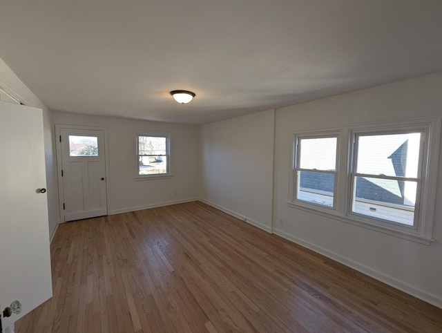 foyer entrance featuring light wood-type flooring