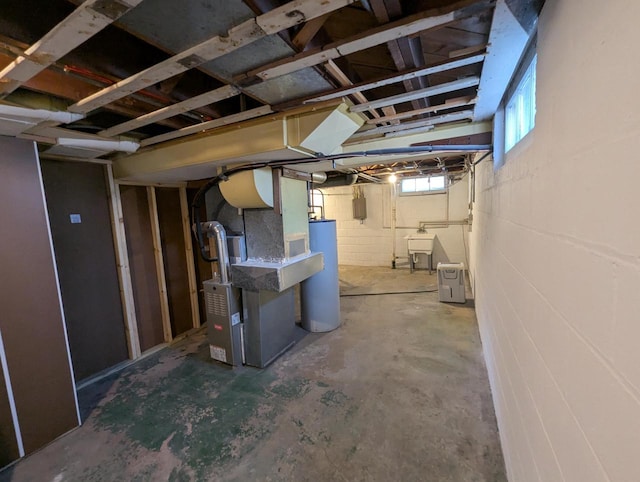 basement with heating unit and gas water heater