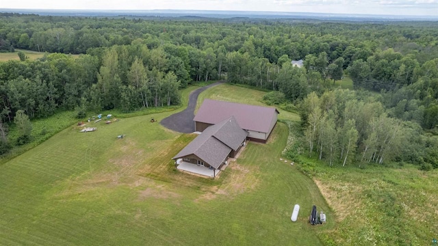 birds eye view of property with a rural view