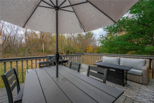 wooden deck with an outdoor hangout area