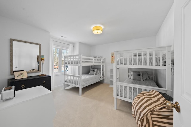 bedroom featuring carpet