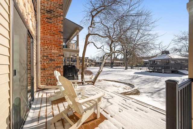 view of snow covered deck