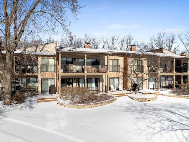 view of snow covered property