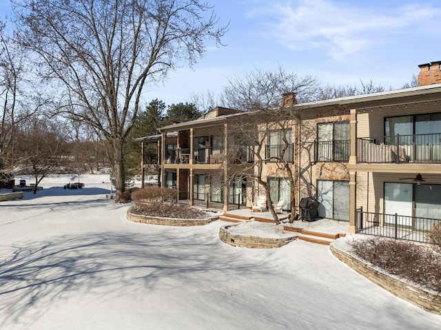 view of snow covered property