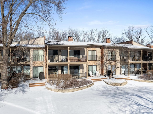 view of snow covered building