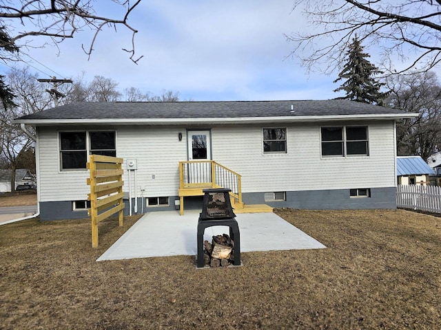 rear view of house with a patio area