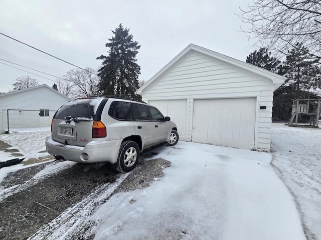 view of snow covered garage