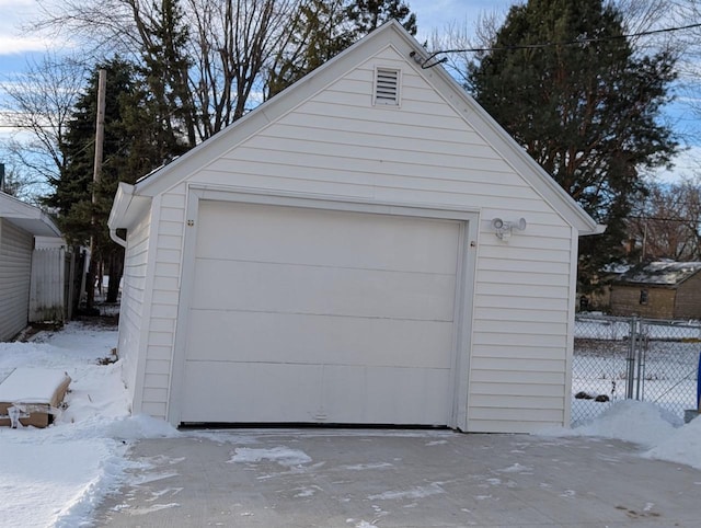 view of snow covered garage