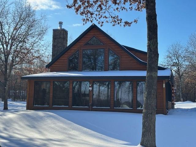 view of snow covered property