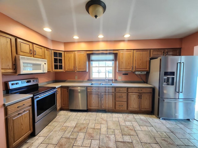 kitchen featuring appliances with stainless steel finishes and sink