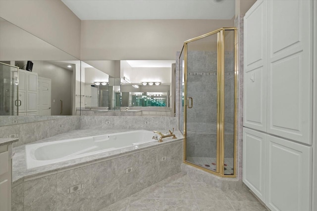 bathroom featuring independent shower and bath and tile patterned floors