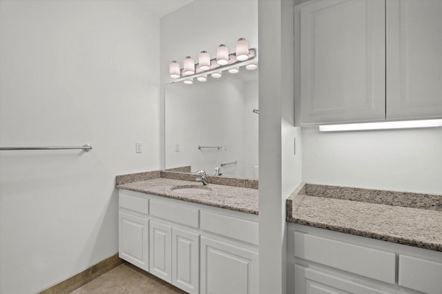 bathroom featuring vanity and tile patterned flooring