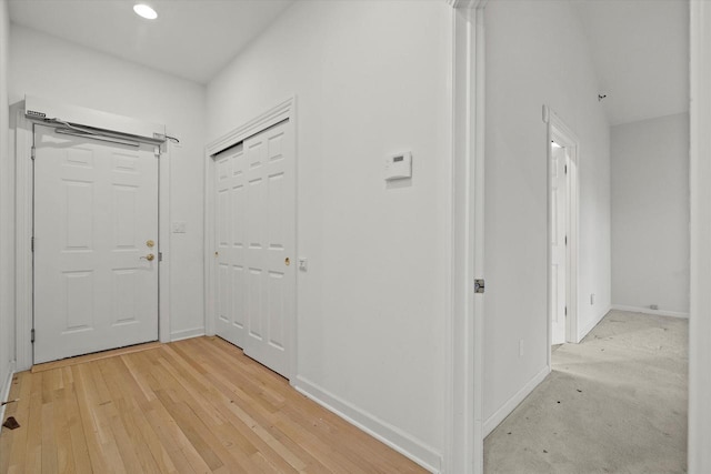 hallway featuring light hardwood / wood-style flooring