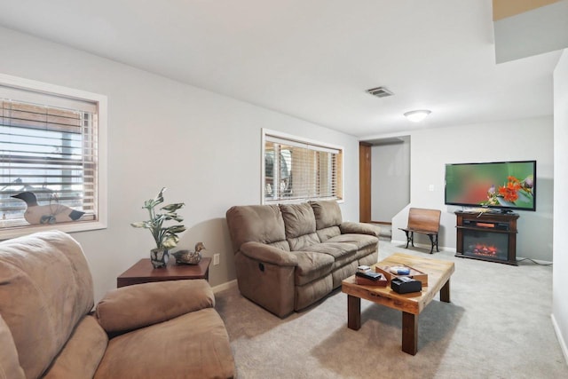 living room featuring light colored carpet