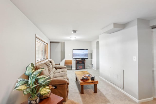 living room with light colored carpet