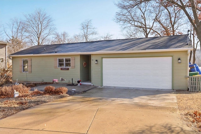 single story home featuring a garage