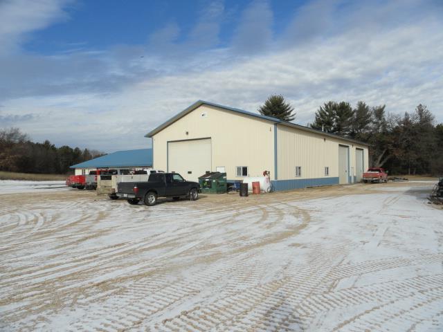 N8621 5th Rd, Westfield, WI 53964 - view of outbuilding with a garage