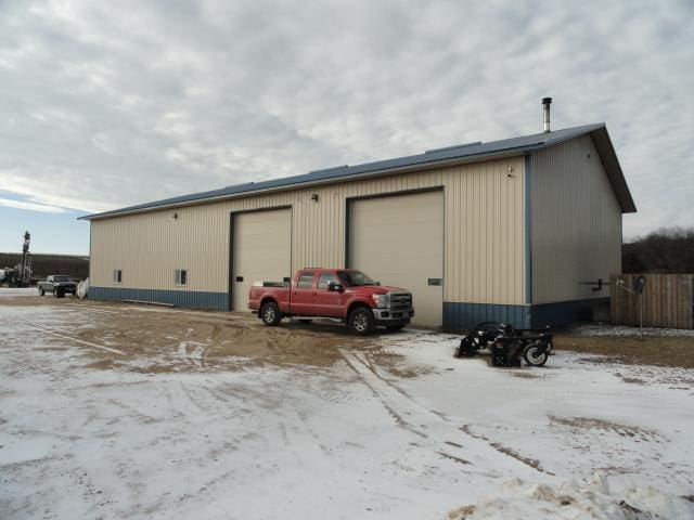 N8621 5th Rd, Westfield, WI 53964 - snow covered structure with a garage