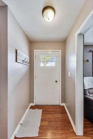 doorway to outside featuring hardwood / wood-style floors