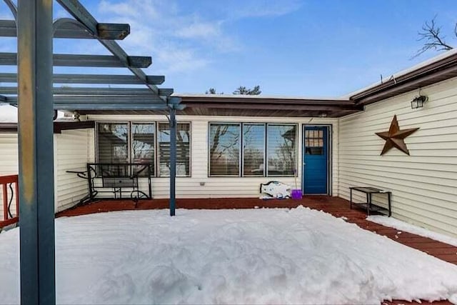 view of snow covered patio