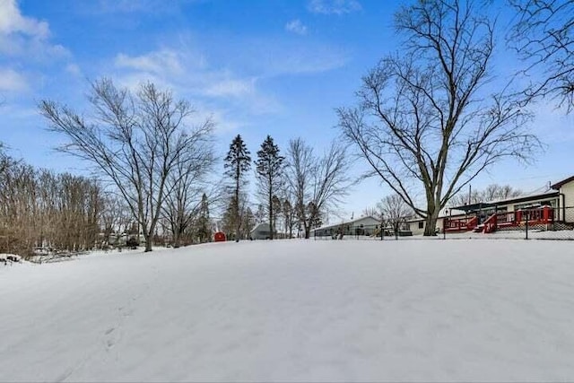 view of yard covered in snow