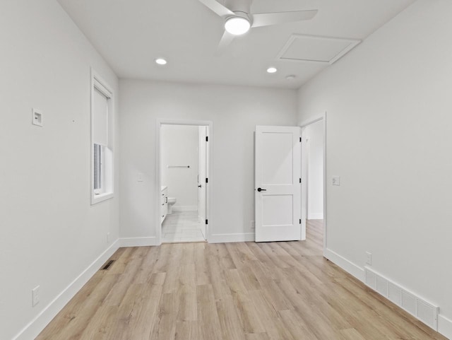 spare room with light hardwood / wood-style flooring