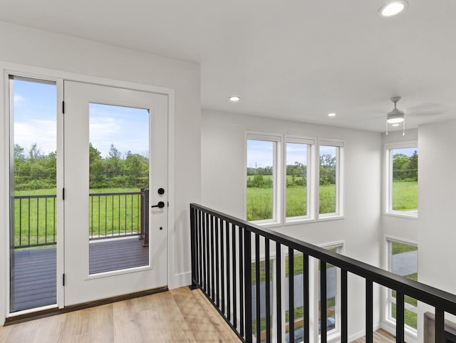 entryway with light hardwood / wood-style flooring