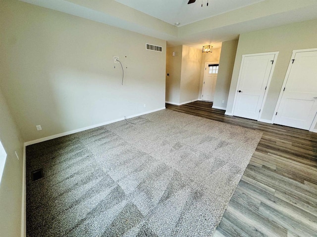 spare room featuring ceiling fan and hardwood / wood-style floors