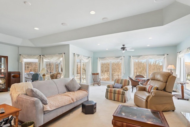 living room featuring ceiling fan, recessed lighting, and light colored carpet