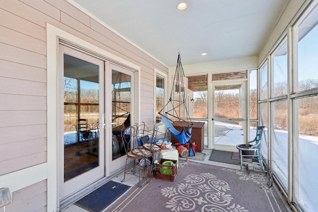 unfurnished sunroom with a healthy amount of sunlight